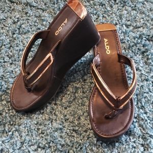Aldo Black leather wedge flip flops